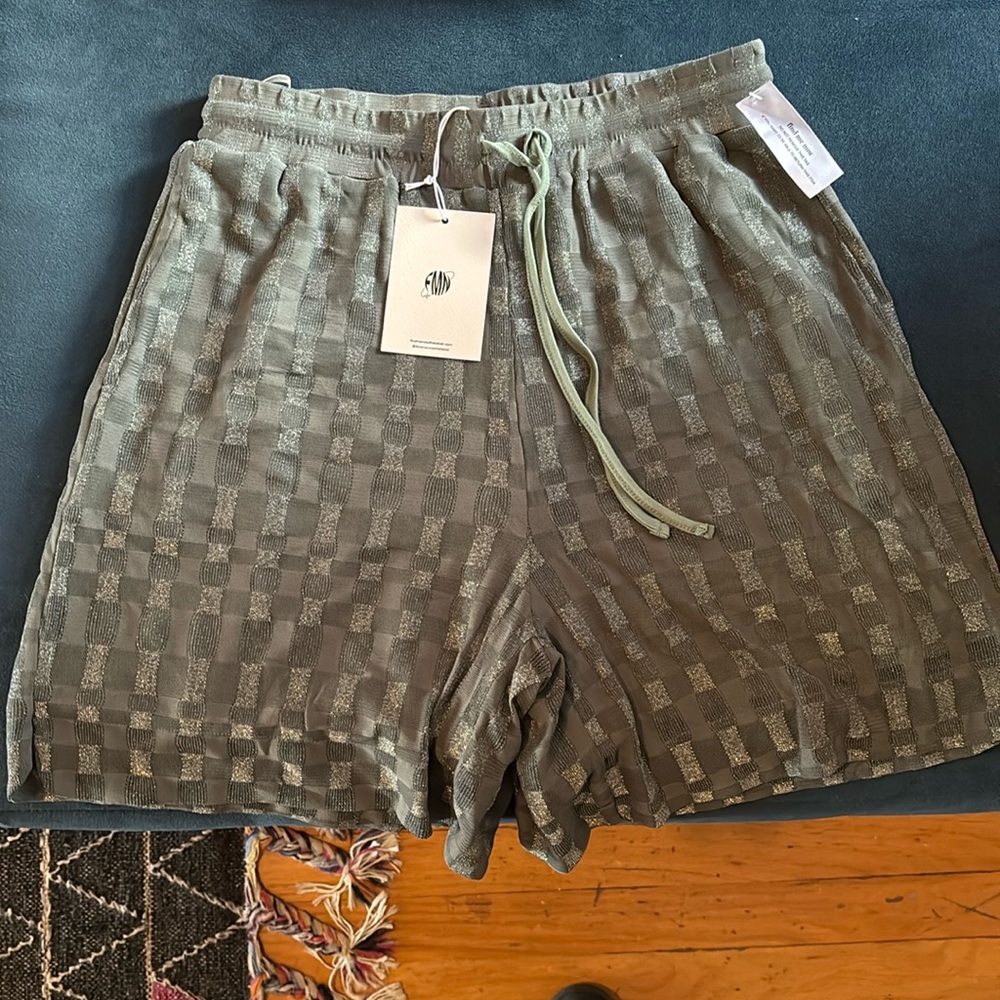 Two pair of find me now shorts! Glittery and relaxed in size M and L